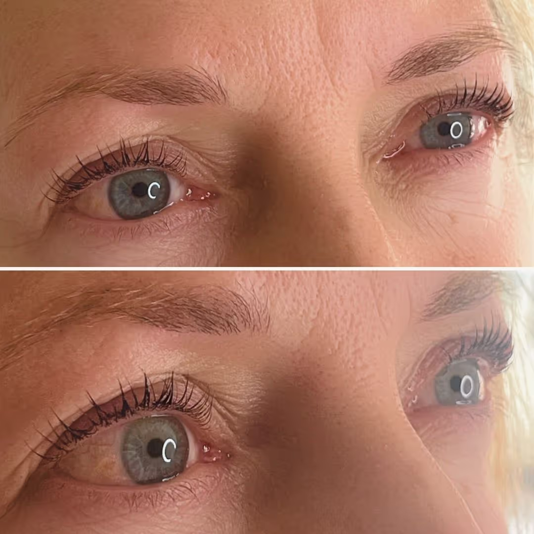 Close-up of a woman's eyes after a lash lift treatment, highlighting lifted and curled eyelashes.
